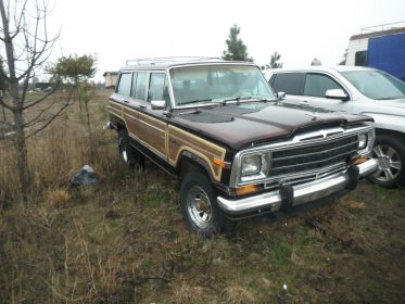 PAIR OF COLLECTABLE GRAND WAGONEERS