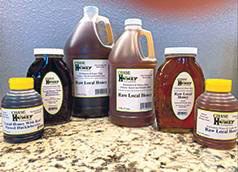 LOCAL RAW HONEY IN 1 LB. TO 4 GALLON QUANTITIES 