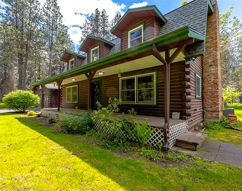 REDUCTION! EXQUISITE DEER PARK LOG HOME ON 5+ ACRES