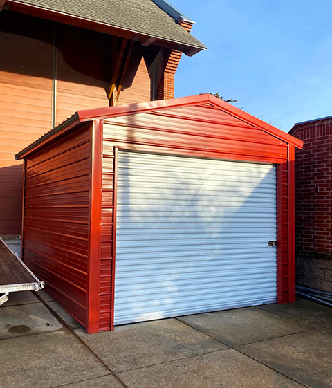 GARAGES, CARPORTS, PORTABLE METAL BUILDINGS & SHEDS