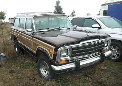 PAIR OF COLLECTABLE GRAND WAGONEERS