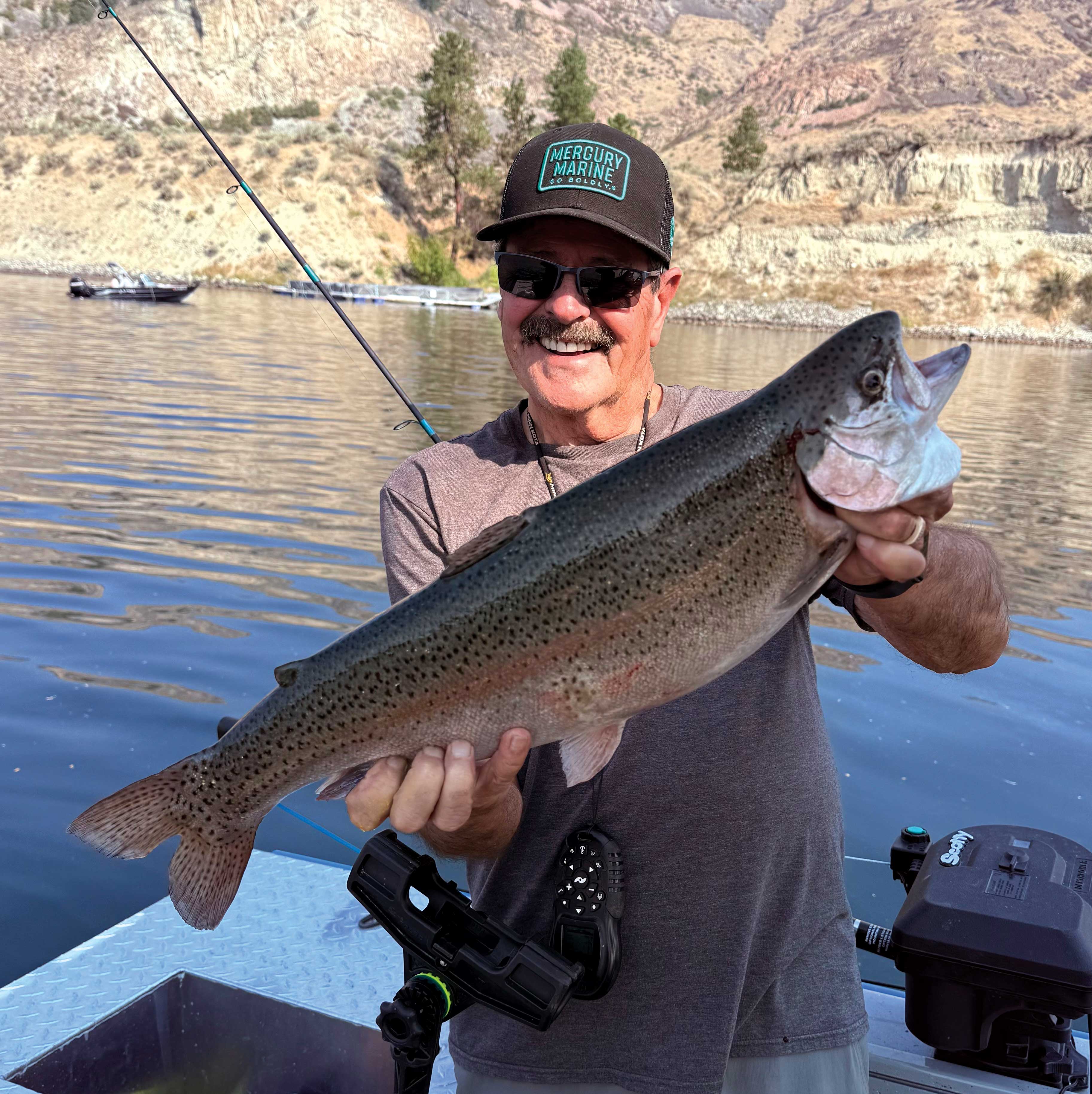 Dave Graybill holds a large perch caught from shore below the I-90 Bridge on Moses Lake during the peak fall bite.