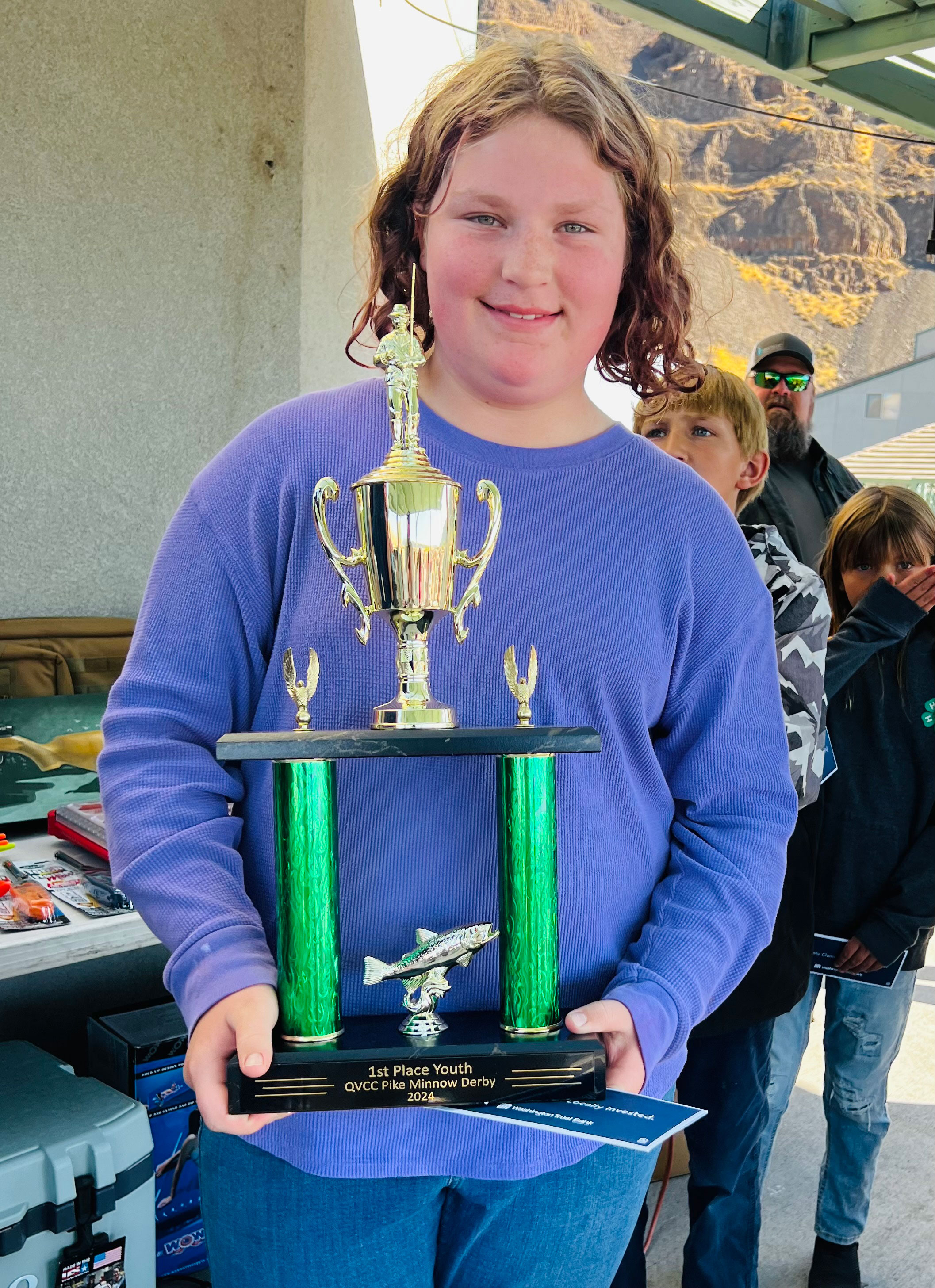 This week's photo is of Quincy's Pike Minnow Derby Winner, Makenzie Nelson