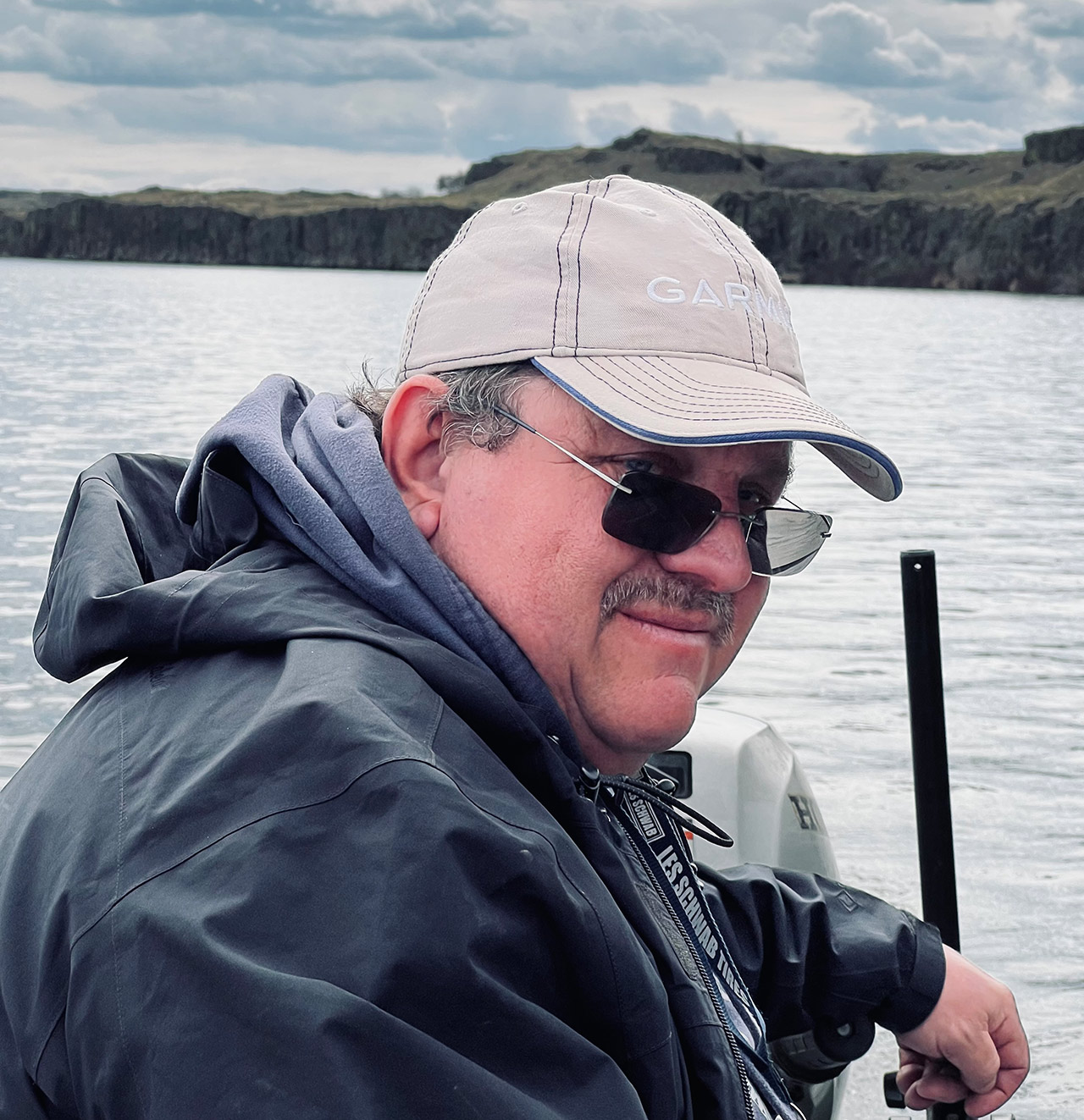 Mike McKee at the helm of his drift boat.