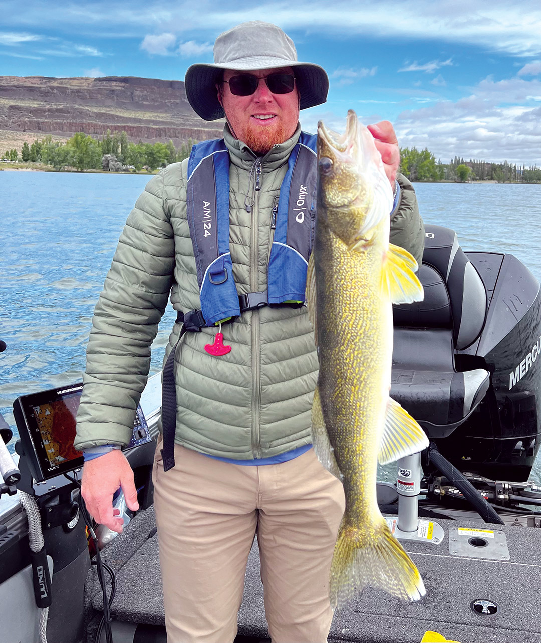 Mike Wren with one of the walleye he landed.