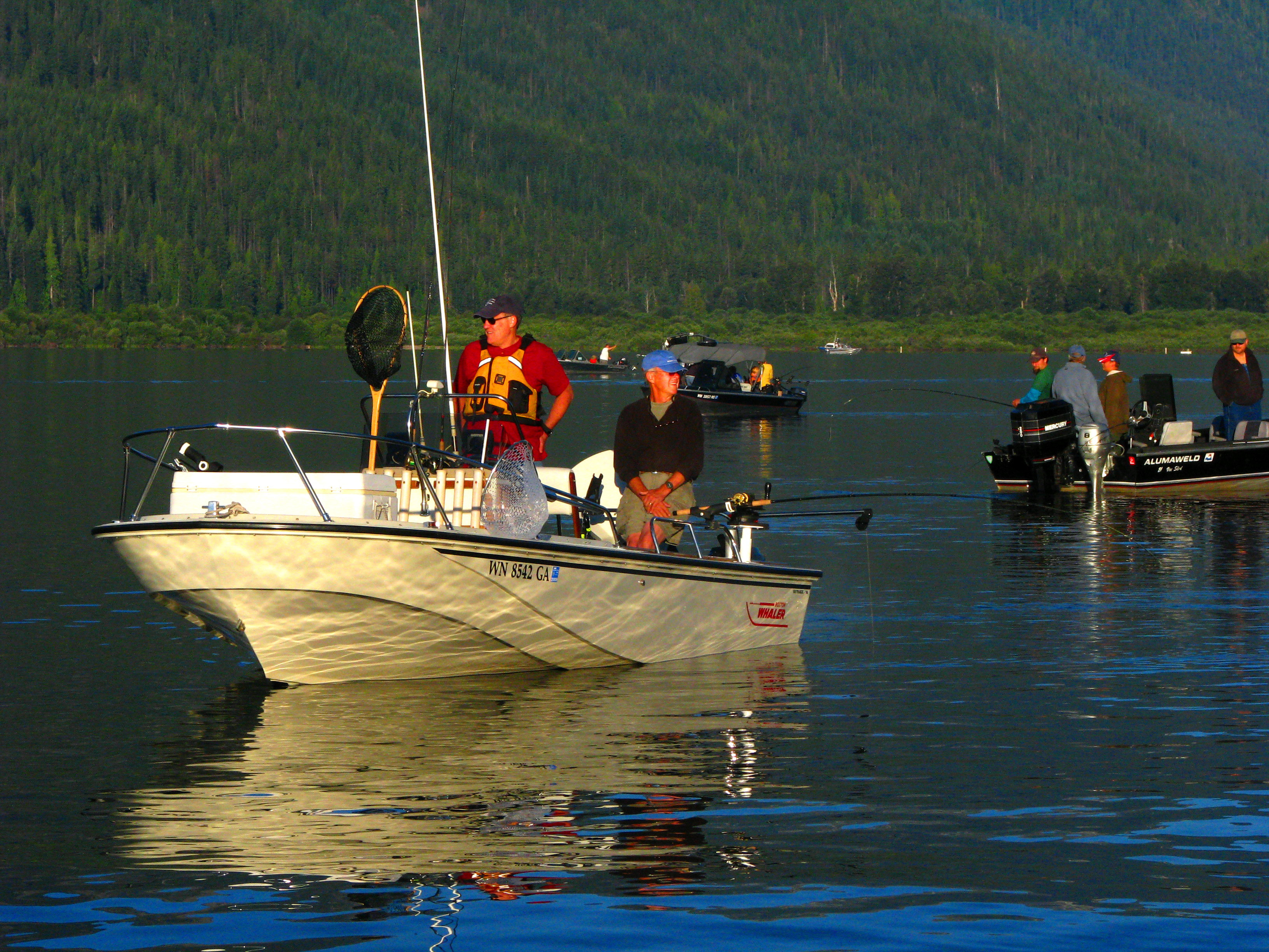 Rollie Schmitten in the back of his boat on Lake Wenatchee, preparing for the sockeye fishing season.