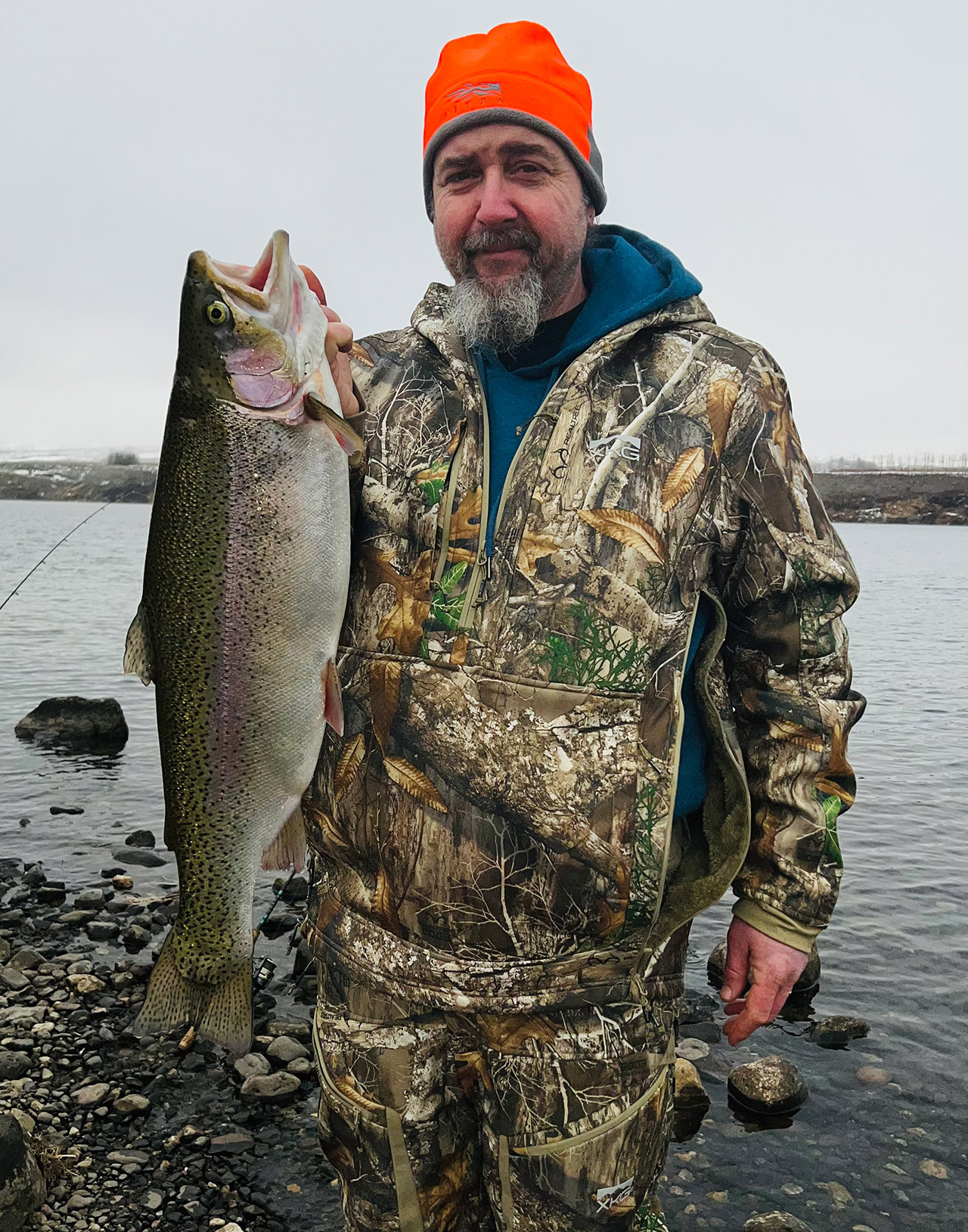 This week's photo is of Keith with one of the trout we caught.