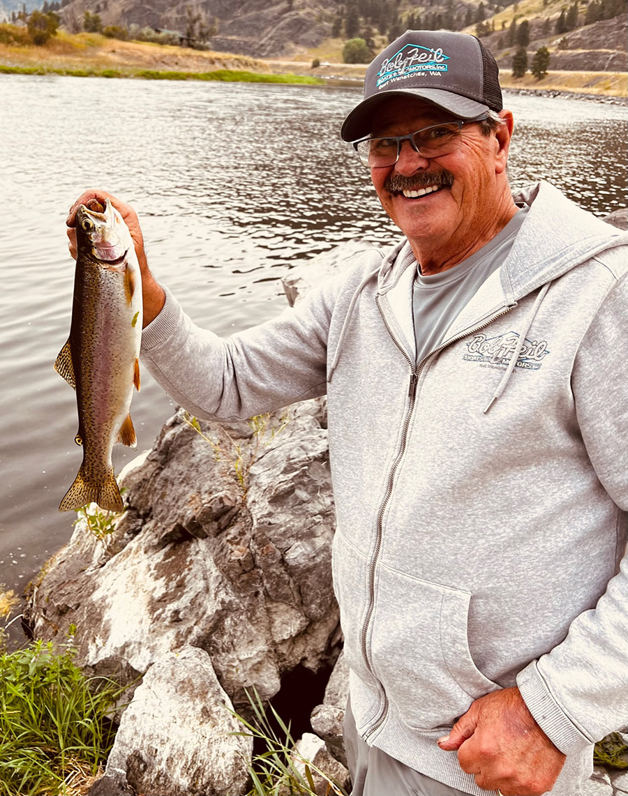 Dave Graybill with the smaller rainbow he caught.