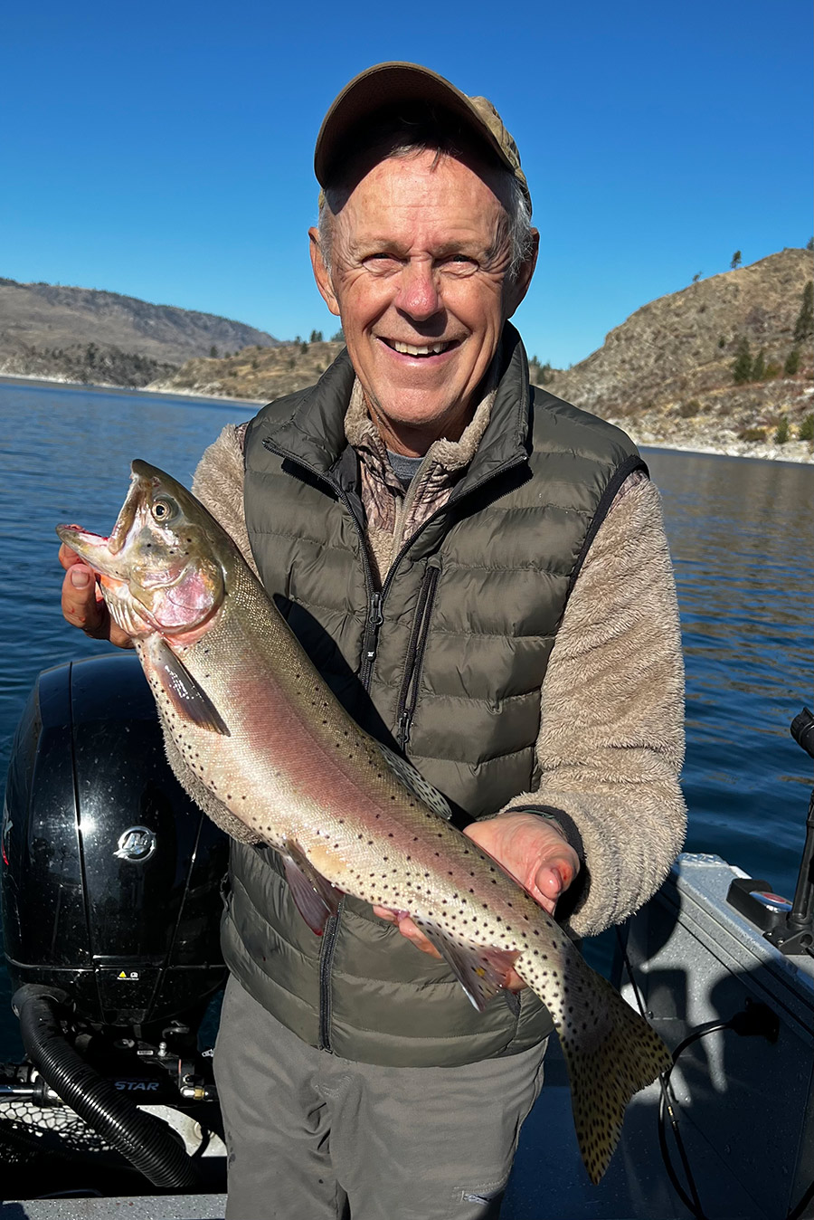 Rollie with one of the cutthroat caught on Omak Lake.