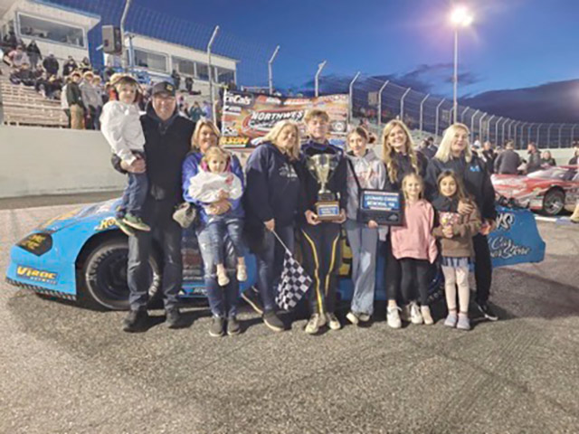 Jan Evans surrounded by family and friends following his victory at the Wenatchee Super Oval.