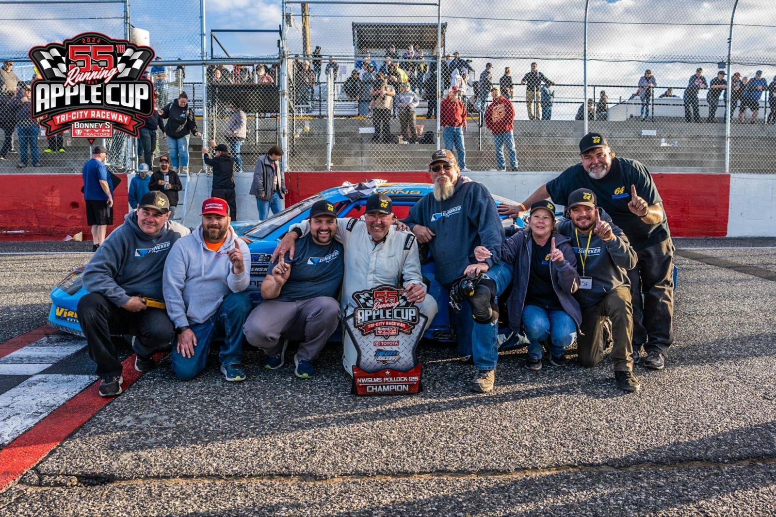 Garrett Evans and crew celebrate the team’s sixth Apple Cup win April 7 at Tri City Raceway